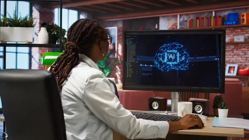 Une analyste travaille devant un écran qui affiche une visualisation d'intelligence artificielle.